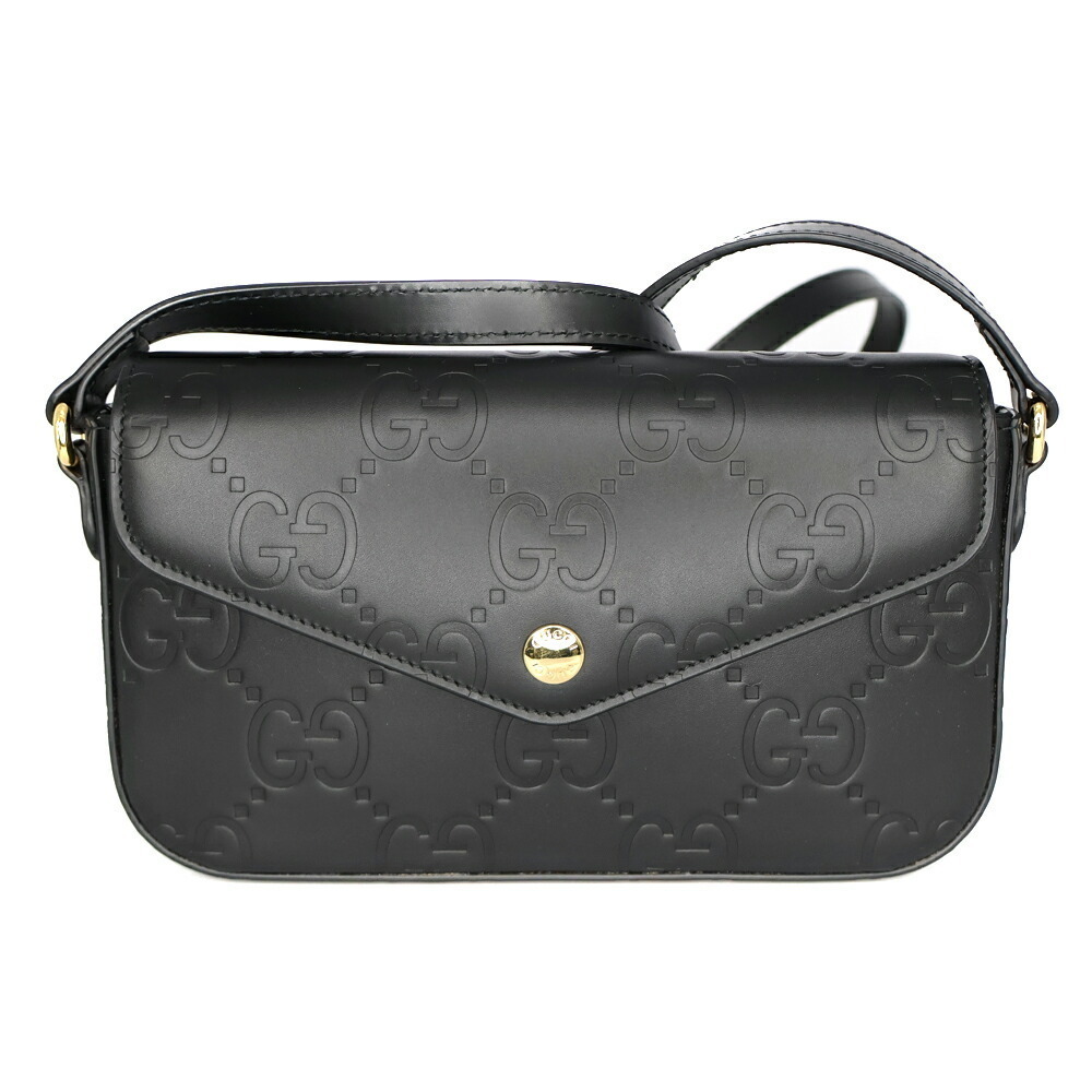 Gucci GG embossed black leather super embossed GG calfskin flap
